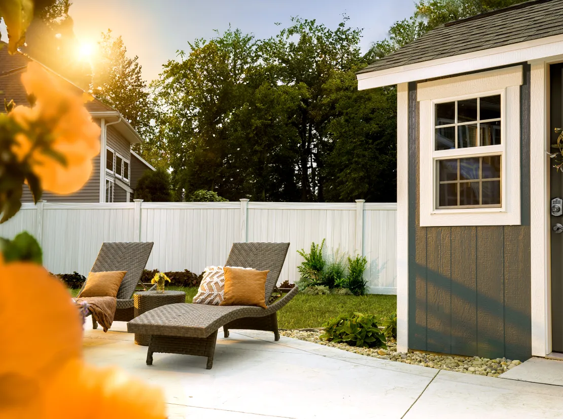 backyard seating area next to a shed