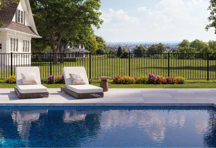 black aluminum picket fence around backyard pool