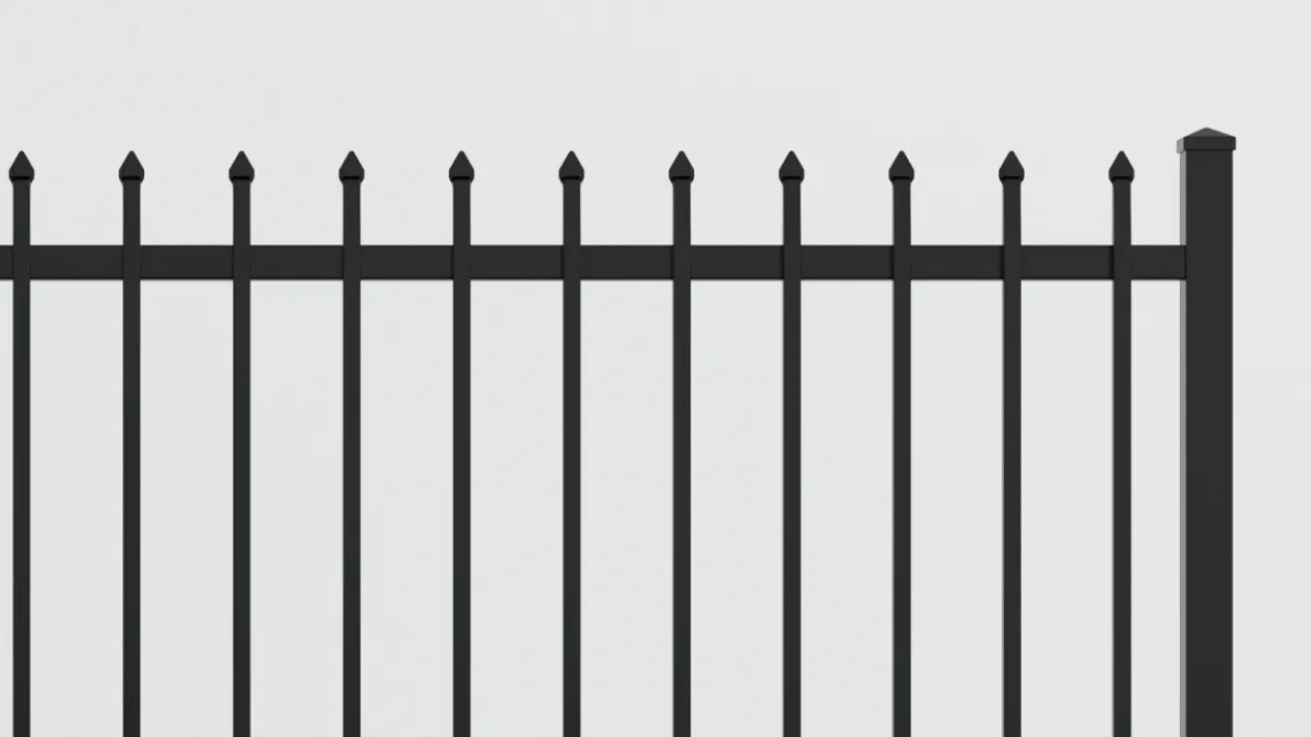 close up of black picket fence